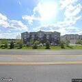 Person experiencing abdominal pain at residential address