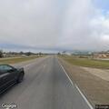 Two deer blocking highway traffic in Bayou Vista
