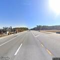 Person experiencing chest pain at highway location