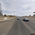 Person standing in middle of road on US-180