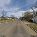 Officer checks possible burglary suspect at intersection