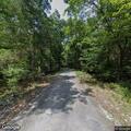 Tree blocking roadway on Limestone Parkway