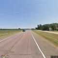 Cows near roadway on Highway 20 by Emmet