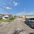Officers detain person near garage in Pekin