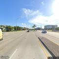 Traffic lights flashing at busy intersection