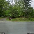 Vehicle off road and still running on State Hill Road