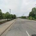 Female pedestrian walking near exit ramp in St Paul