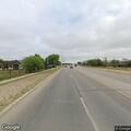 Officer assists driver with flat tire in Poteet