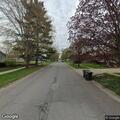 Traffic stop on blue Nissan Versa in Hobart