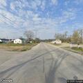 Person showing emotional distress at intersection in West Terre Haute
