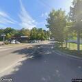 Person urinating under bridge near Main Street