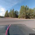 Person flees vehicle near Highway 97 in meadow