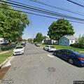Person experiencing abdominal pain near Dundalk