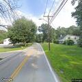 Person receiving CPR after cardiac arrest on Maple St