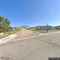 Trespassing complaint near red house on corner