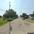 Driver does not stop for officer in roadway