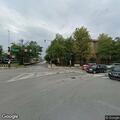Parked car hit by fleeing vehicle near Metra station
