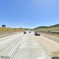 Pedestrian walking on shoulder of northbound I-5