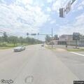 Pedestrian with cart in traffic lane