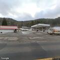 Three unresponsive persons found in crashed vehicle at gas station