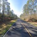 Mobile home and woods fire on Highway 57