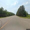 Pickup with camper swerving on Highway 6