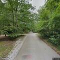 Tree blocking road in Beverly Shores