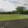 Man yelling to himself at bandstand in Hilo