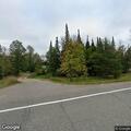 Motorcycle collides with bear on County Road 14