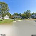 Person experiencing abdominal pain at Boxwood Ln