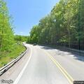 Tree on power lines blocks road in Stewart Township