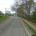Elderly pedestrian hit by vehicle at apartments