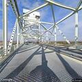 Traffic call involving white Ford F-150 on bridge
