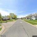 Traffic stop on light-colored Acadia in Onsted