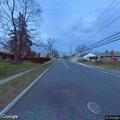 Tree blocks driveway and part of roadway