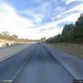 Reckless white van driving on Highway 100