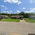 Men with knives in yard at Industrial Boulevard home