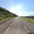 Deer reported in roadway on I-86 near mile marker 21
