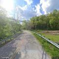 Downed utility line blocking lane on Bear Run Road