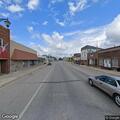 Unattended pickup strikes parked car in Henning
