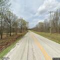 Brush fire at small structure on State Highway B