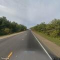 Erratic orange vehicle reported on Highway 63