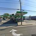 Complaint about person sleeping at gas station