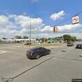Disabled vehicle blocking lane on E 10 Mile Road