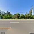 Report of swerving blue minivan near 115th and Cortez