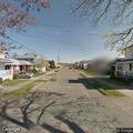 Tree hazard reported in water on Sullivan Street