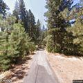 Rescue team carries patient from Lewis Creek Trailhead