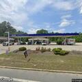 Damaged SUV leaves gas station on West River Road