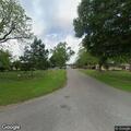 Suspicious person in dark truck at Meadow Lane home