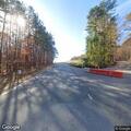 Debris blocking roadway on Covered Bridge Road